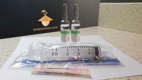 Sterile injection water in vial and sterile syringe for liquid spore