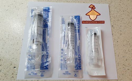 Syringe for liquid spore suspension