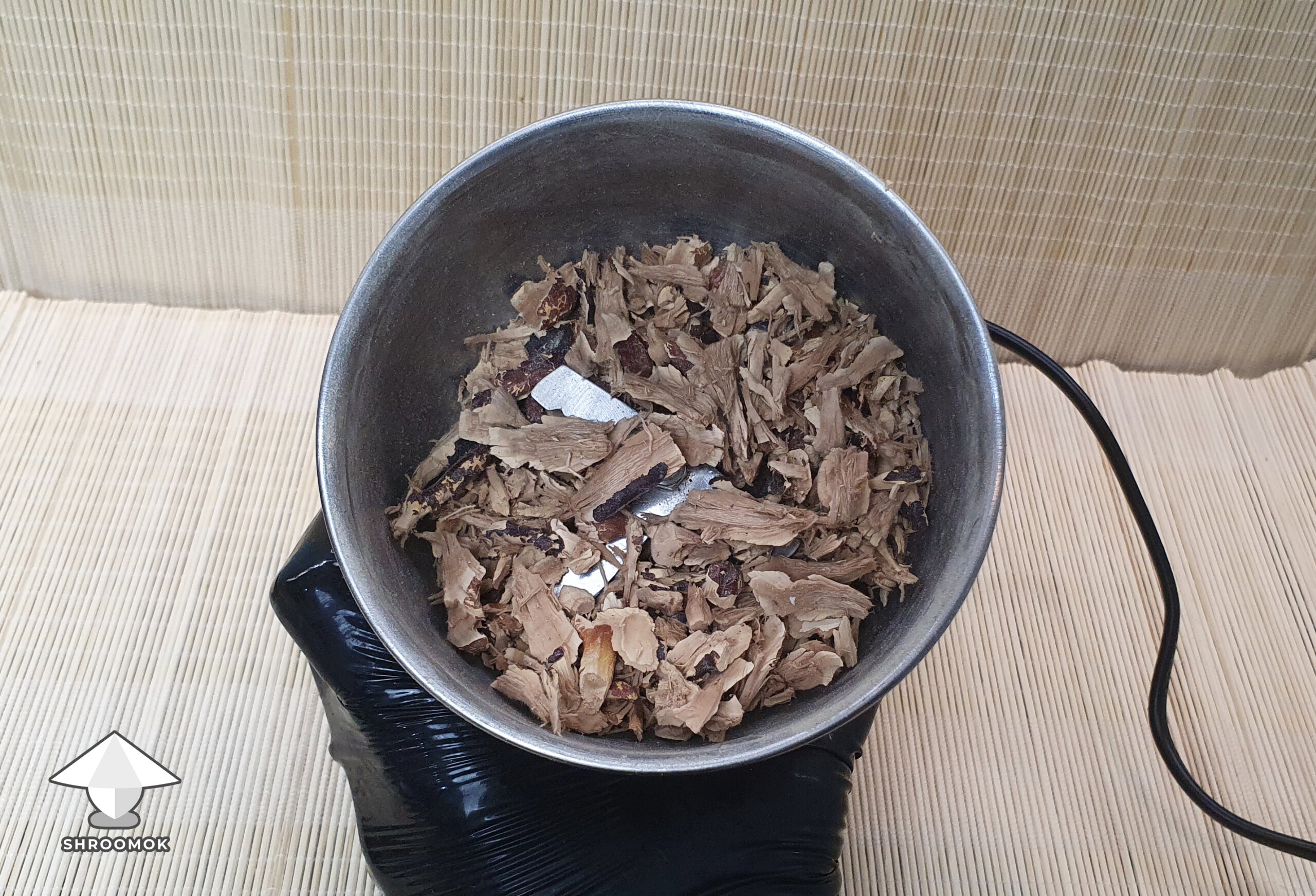 Dry reishi grinded in coffee grinder