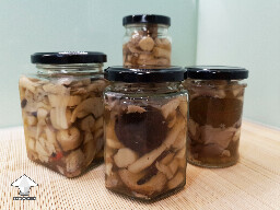 Mushrooms in jars ready for fermentation process