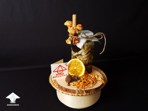 Decorated jar with fermented mushrooms