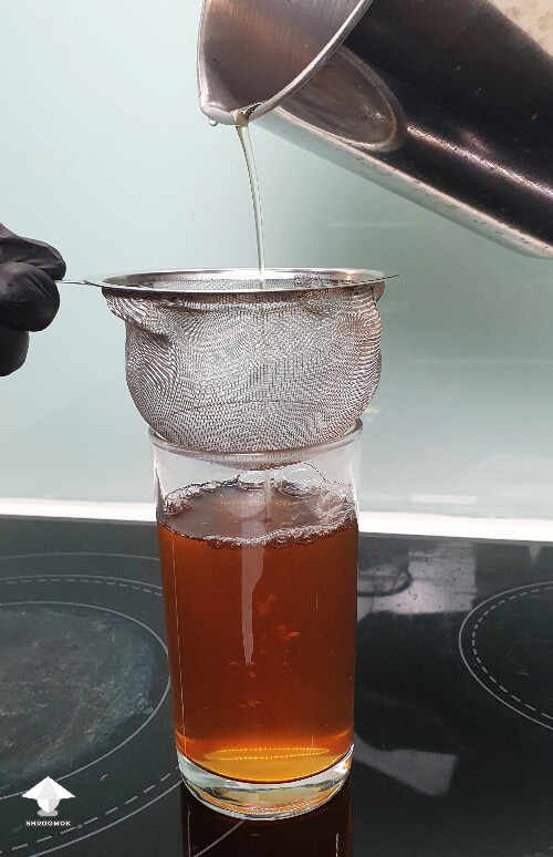 Filter the reishi drink through a tea strainer
