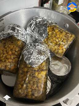 Is it safe to sterilize grain if the top three quart jars are touching the PC