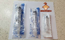 Syringe for liquid spore