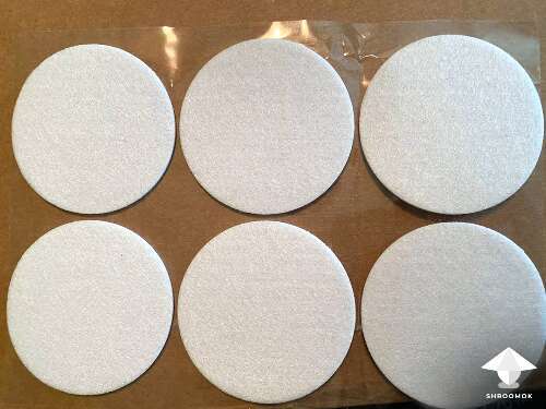 Adhesive filters for monotube